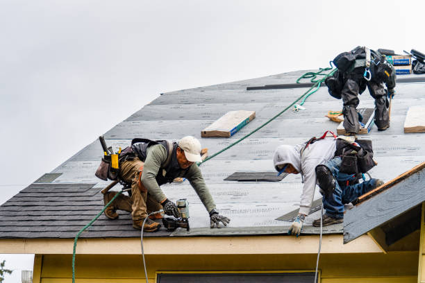 Professional Gutter Installation technician working in Manchester, CT
